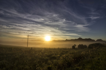 Fototapeta na wymiar Sunrise with mist