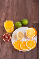 Citrus juice and fruits slices