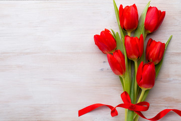 Red tulips, spring flowers and Easter decoration.