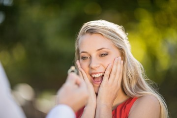 Woman surprised after seeing the ring