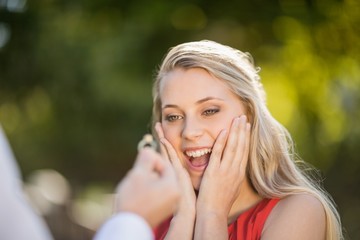 Naklejka premium Woman surprised after seeing the ring