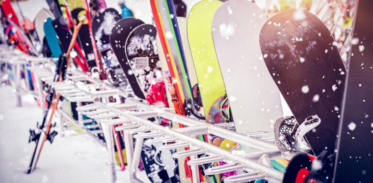 Snowboards and skis kept together
