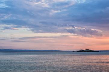 Naklejka na ściany i meble Gorgeous sea and sky colors in the dusk, Sithonia, Chalkidiki, Greece 