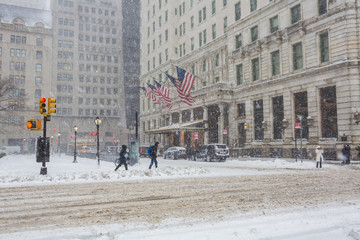 Obraz premium NEW YORK CITY - Feb 9: Grand Army Plaza in New York on February; 2017. Grand Army Plaza lies at the intersection of Central Park South and Fifth Avenue in front of the Plaza Hotel in Manhattan..