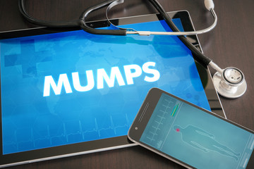 Mumps (infectious disease) diagnosis medical concept on tablet screen with stethoscope