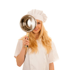 young blonde chef woamn holds kitchenware as she prepares to cook a meal isolated over white background