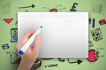 Composite image of hand holding black crayon