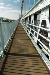 Footpath part of deck of the Menai Suspension Bridge over between Anglesey and mainland Wales
