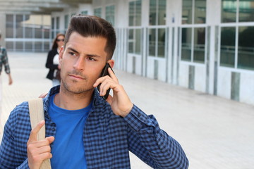 Annoyed young male on the phone