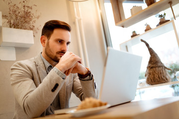 Fototapeta premium Working In A Cafe