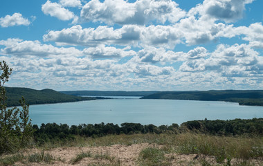 Fototapeta na wymiar Lake, Clouds, from a Hill