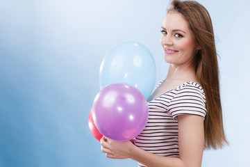 Naklejka premium Woman summer joyful girl with colorful balloons