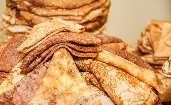 A stack of folded pancakes while celebrating Russian Shrovetide (pancake week)