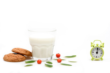 Cup of milk and cookies isolated on white background