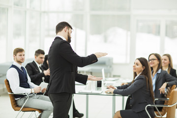 Fototapeta premium senior Manager of the company holds a working meeting with business team in modern office