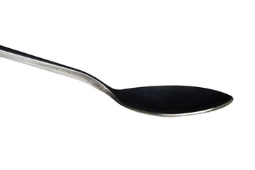 A spoon close isolated on a white background