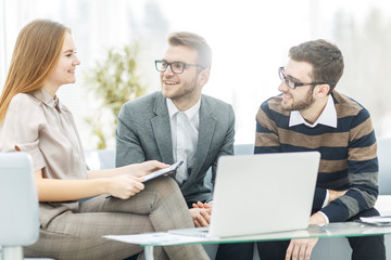Fototapeta premium senior Manager and members of the business team discussing a financial plan of company development in the workplace