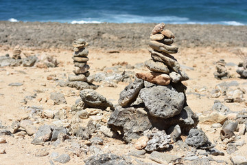 The cairns of Wish Rock tourist spot on the Northern coastline of Aruba