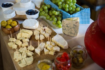 Various types of cheese at counter