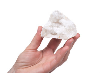 Young woman holding clear crystal quartz geode with crystalline druzy center isolated on white...