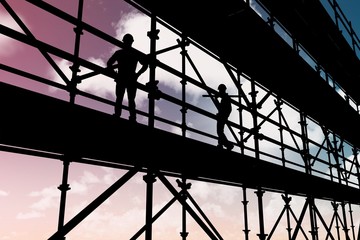 Composite image of smiling worker carrying wooden planks 3d