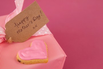 Close-up of gingerbread cookie with gift box