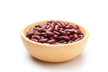 Red kidney beans in a wooden bowl on white background