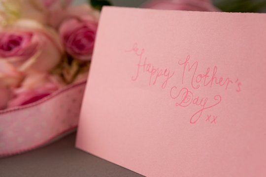 Close-up of happy mothers day card