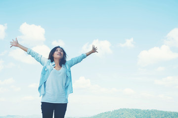 woman hiking  enjoy the beautiful view at mountain for sun light