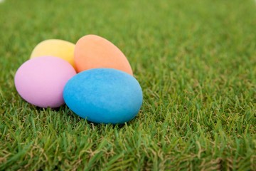 Fototapeta na wymiar Painted Easter eggs arranged on grass