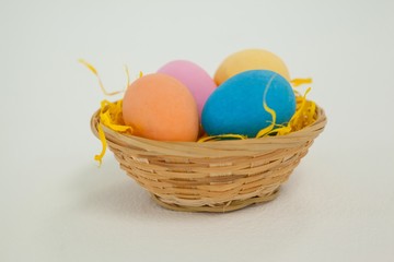 Painted easter eggs in basket