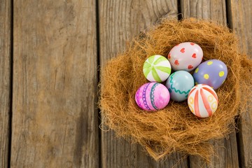 Painted Easter eggs in nest