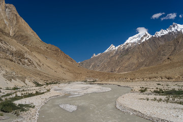Fototapeta premium Curve of river and trail o K2 base camp, K2 trek, Pakistan