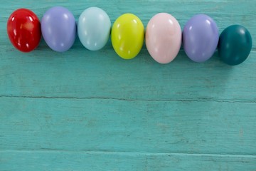 Multicolored Easter eggs arranged in a row