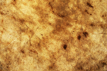 Close-up view of an old antique drumhead surface is made from buffalo leather. Abstract full frame detail of an old skin drumhead. Natural leather texture background from musical instrument.
