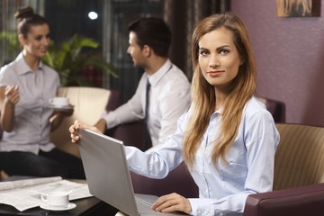 Fototapeta na wymiar Businesswoman portrait with laptop