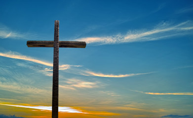Old Wooden Cross over blue sky