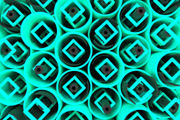 Pattern of colored tubes, repeated square elements, black hexagons and surfaces
