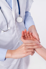 traditional chinese doctor measuring pulse of patient, alternative medicine concept