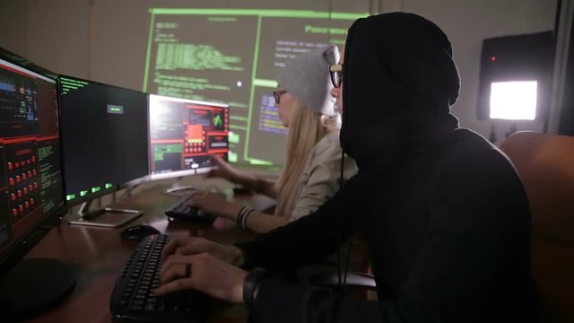 The hacker team breaking security system. Cybercrime, cyber security concept. HD.