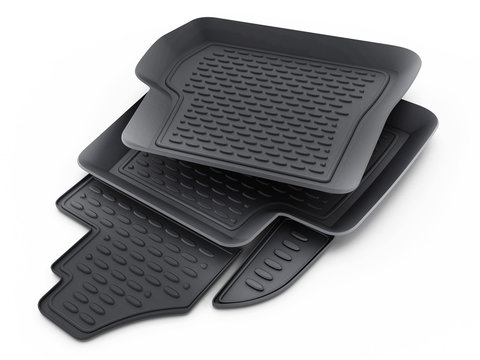 Black rubber car mats isolated on white background. 3D illustration
