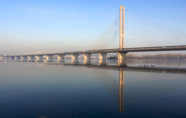 South bridge, kiev, against the blue sky