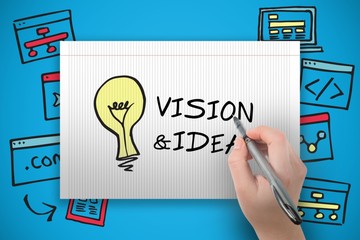 Composite image of hand holding black crayon