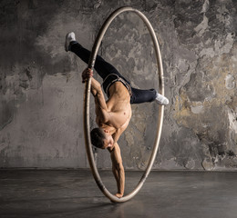 Circus artist in aCyr Wheel