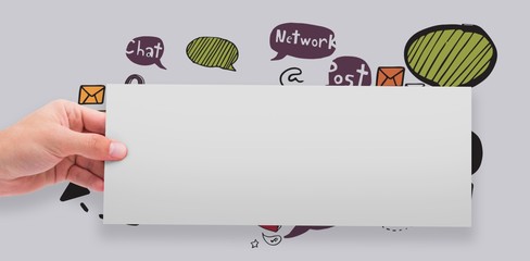 Composite image of hand showing card