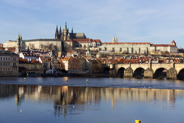 View on the autumn Prague gothic Castle with the Charles Bridge, Czech Republic