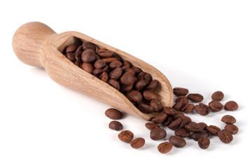 coffee beans in a wooden scoop isolated on white background