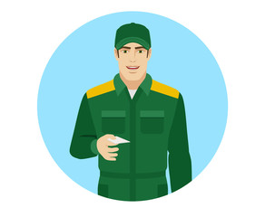 Man in uniform gives a business card