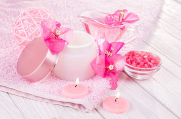 Spa set with towel, candles, salt and flowers