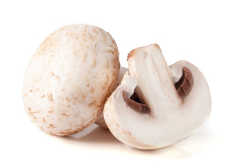 champignon mushrooms and half isolated on white background
